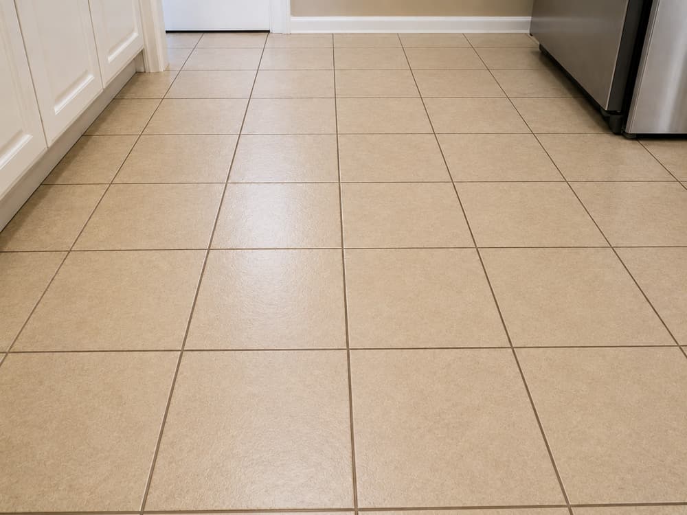 Kitchen floor grout cleaning & color seal — after